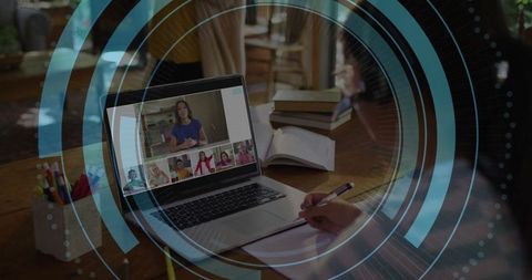 Student engaged in online class with focus on learning