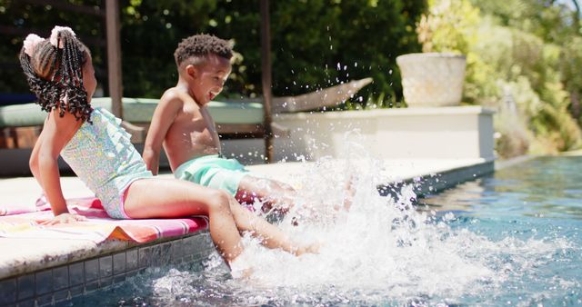 Children Splashing Water by Swimming Pool on Sunny Day - Download Free Stock Images Pikwizard.com