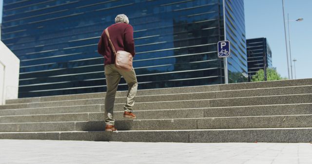 Businessperson Climbing Outdoor Stairs Near Office Building - Download Free Stock Images Pikwizard.com