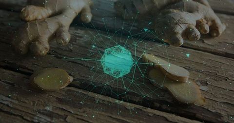 Futuristic digital sphere hovering over ginger on wooden table