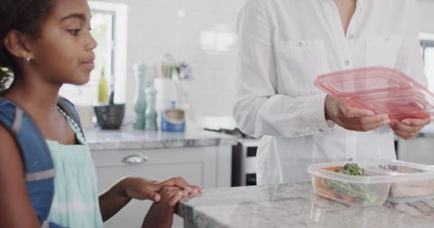 Mother and Daughter Preparing Healthy Meal in Kitchen - Download Free Stock Images Pikwizard.com