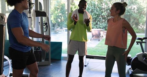 Young Adults Enjoying Workout in Home Gym Setting
