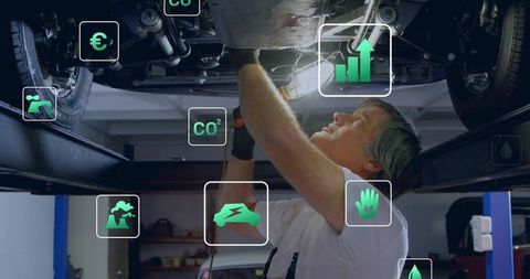 Mechanic Innovating High-Tech Vehicle Repairs with Sustainability Focus