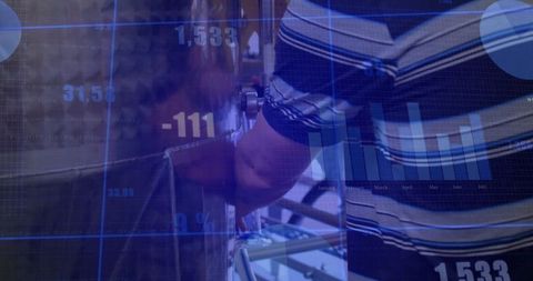 Engineer Operating Industrial Tank with Digital Analytics Overlay