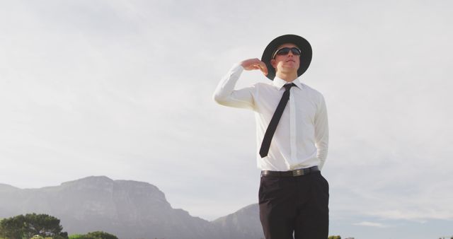 Confident Young Businessman in Sunglasses Enjoying Outdoors - Download Free Stock Images Pikwizard.com