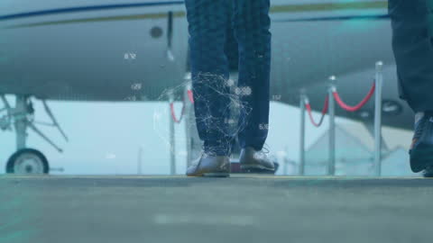 Businesswomen Walk With Technology Grid Overlayed