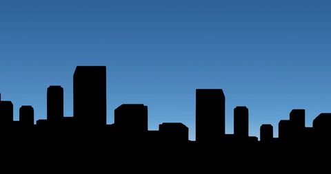 City building silhouette against twlight sky creating calm effect