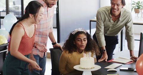 Office Team Celebrates Birthday with Cake and Surprise
