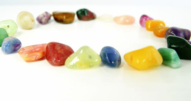 Colorful Polished Stones Arranged in Circle on White Background - Download Free Stock Images Pikwizard.com