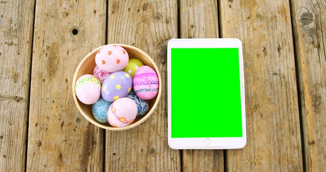 Easter Eggs in Basket and Tablet with Green Screen on Wooden Table - Download Free Stock Images Pikwizard.com