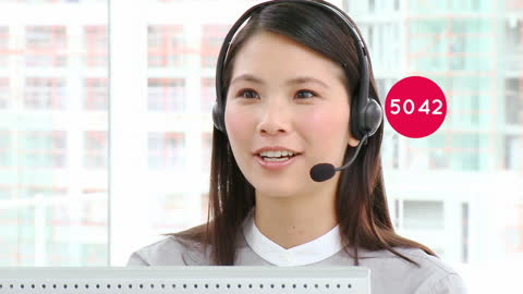 Asian Businesswoman Connecting Through Communication Headset