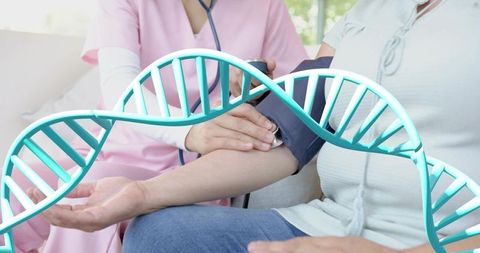 Nurse measuring patient blood pressure homecare with stethoscope and DNA helix overlay