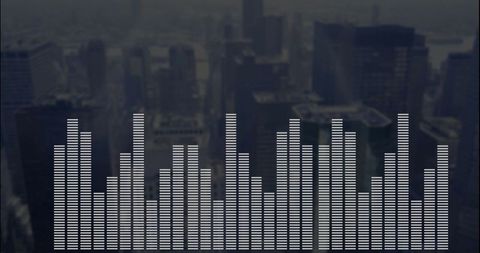 Digital equalizer bars overlaying urban skyline at dusk