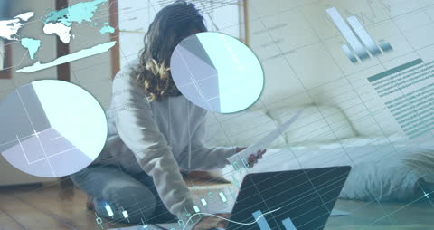 Woman Engaging with Financial Data on Laptop