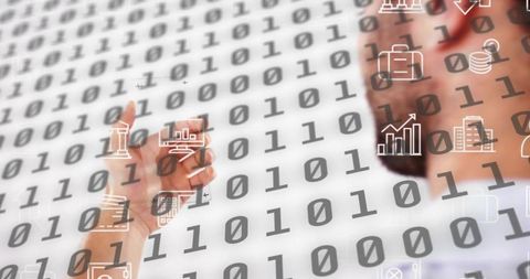 Businessman pointing and interacting with floating data dashboard over binary code