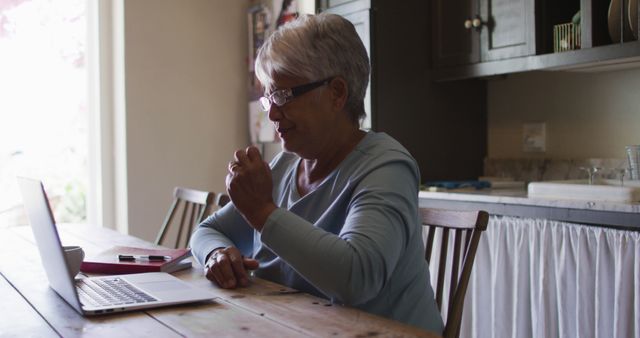 Senior Woman Laughing While Using Laptop at Home - Download Free Stock Images Pikwizard.com