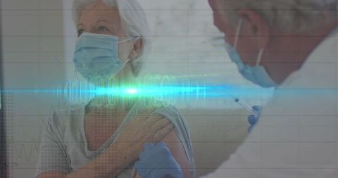 Senior woman receiving vaccination with data overlay technology