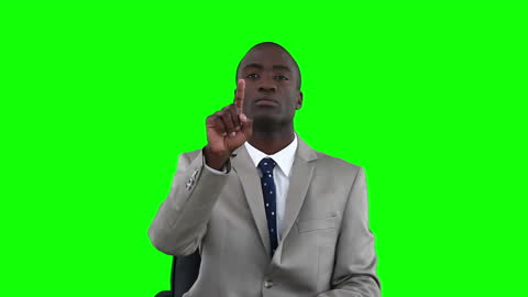 Businessman on Green Background Interacting with Virtual Screen