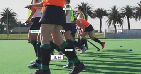 Teen Athletes Training Field Hockey on Coastal Turf Pitch