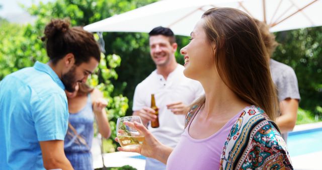 Friends Socializing Outdoor by Pool with Drinks - Download Free Stock Images Pikwizard.com