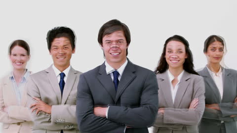 Diverse Business Team with Crossed Arms Smiling at Camera