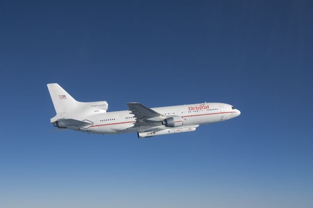Capturing an Orbital Sciences L-1011 carrier aircraft airborne over the Pacific Ocean, this photograph documents a crucial moment during NASA's IRIS spacecraft launch mission. This historic flight involved launching the IRIS, or Interface Region Imaging Spectrograph, into low-Earth orbit using an Orbital Sciences Pegasus XL rocket. Ideal for use in aerospace publications, educational materials, and articles about satellite launches and space missions.