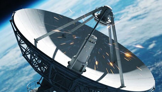 Welding sparks emitting from parabolic satellite antenna in low earth orbit over blue planet