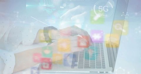 Business Professional Typing on Laptop with 5G Holographic Icons