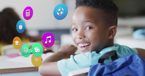Happy Child in Classroom Surrounded by Education Icons - Download Free Stock Images Pikwizard.com
