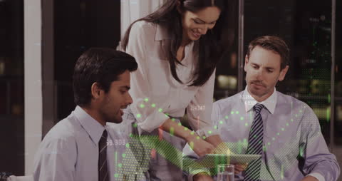 Business Team Collaborating on Digital Tablet in Office