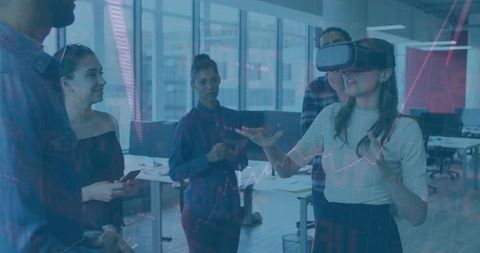 Woman Using VR Headset for Financial Analysis in Modern Office