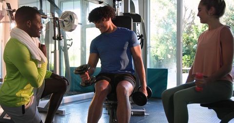 Friends Exercising Together in Gym for Fitness and Health