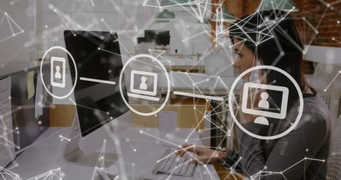 Businesswoman Connected to Global Network Working with Computers - Download Free Stock Images Pikwizard.com