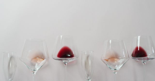 Assorted Wine Glasses with Red and Rose Wine on White Background - Download Free Stock Images Pikwizard.com
