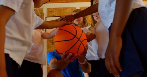 Coach and Kids Team Cooperative Basketball Spirit in Gym - Download Free Stock Images Pikwizard.com