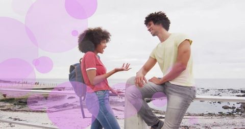 Happy Biracial Couple Talking on Beach Promenade - Download Free Stock Images Pikwizard.com