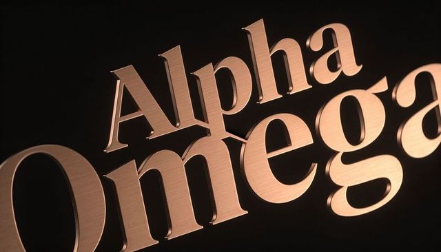 Brushed-copper 3d alpha omega lettering catching warm spotlight over dark matte backdrop