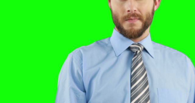 Confident Businessman in Shirt and Tie on Green Background - Download Free Stock Images Pikwizard.com