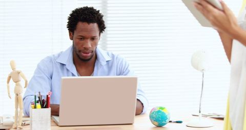 African american businessman working in modern office