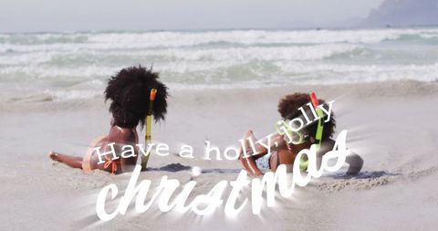 Children Snorkeling at Beach with Christmas Greetings