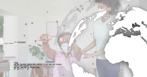 Senior woman performing home rehabilitation while caregiver guiding dumbbell exercises