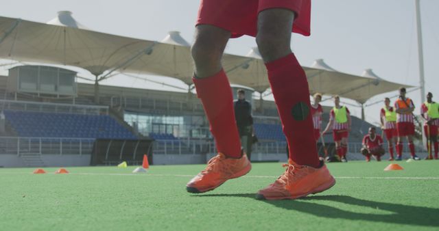 Football Player Dribbling Ball During Training Session on Outdoor Field - Download Free Stock Images Pikwizard.com