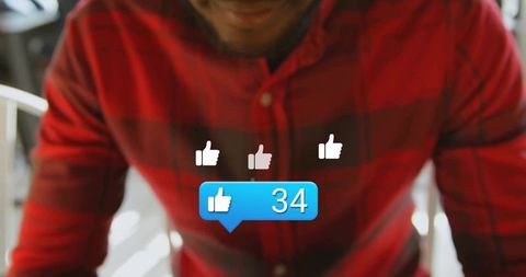 Man Engaging in Social Media Receiving Positive Feedback