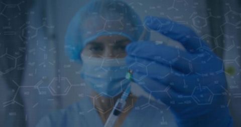 Researcher Preparing Syringe with Molecular Diagrams in Laboratory