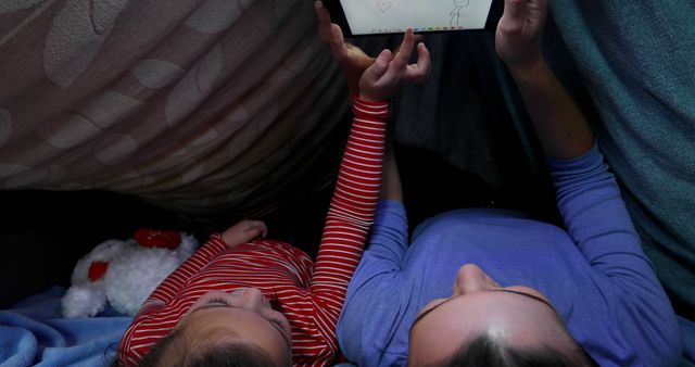 Mother and Child Drawing Together Inside Blanket Fort - Download Free Stock Images Pikwizard.com