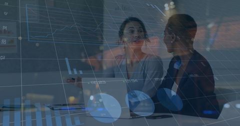 Financial Growth Concept with Female Coworkers Collaborating - Download Free Stock Images Pikwizard.com