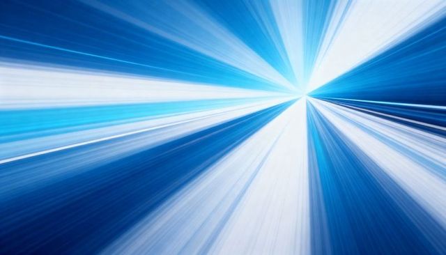 Radiating Blue Light Burst with Central Vanishing Point Conveying Futuristic Motion