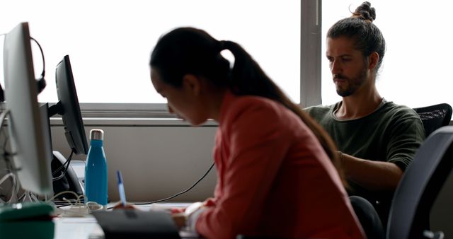 Focused Team Members Working in Modern Office Environment - Download Free Stock Images Pikwizard.com