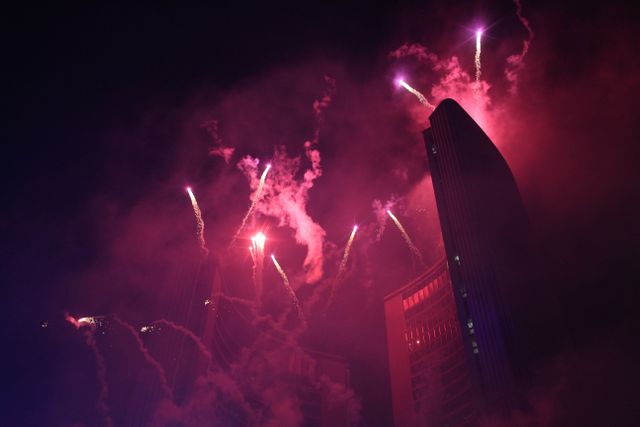 Brilliant Fireworks Display Over Modern Skyscrapers at Night - Download Free Stock Photos Pikwizard.com