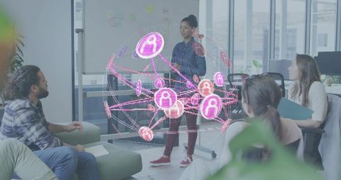 Business team presenting holographic network during collaborative brainstorming session